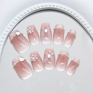 Pink gradient cat-eye press-on nails set with pearls and silver star chain details