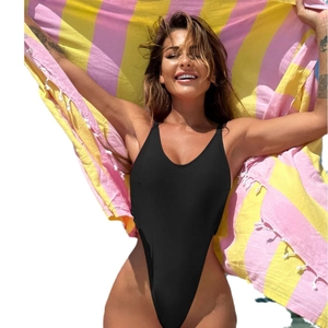 Sexy black one-piece swimsuit featuring deep V-neck and high-cut leg with a striped beach towel