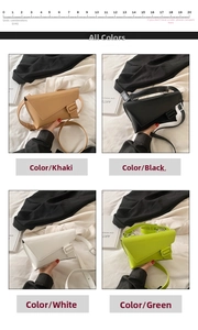 Detail view of the small square crossbody bag showing colors in khaki, black, white, and green