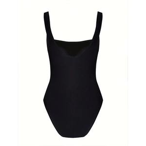 Flat lay of a black one-piece swimsuit with a deep U-neckline and wide shoulder straps