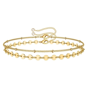 Close-up of gold layered heart bracelet with adjustable lobster clasp and crystal charm