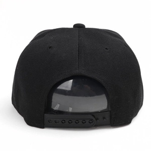 Detail view of the black snapback cap showing adjustable plastic strap and cotton fabric