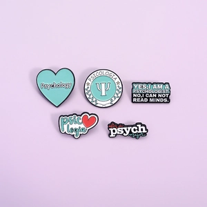5-piece creative psychology enamel pins set in mint green and black on purple background