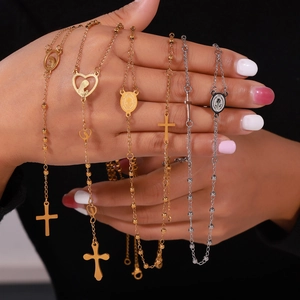 Religious necklace set with gold and silver cross and Virgin Mary charms for women