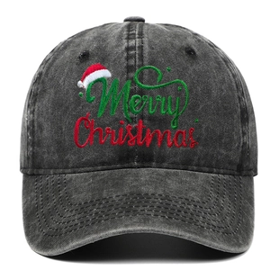 Close-up of Merry Christmas embroidery on washed dark gray denim baseball cap