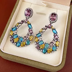 Vintage teardrop hollow earrings with colorful zircons in a premium jewelry display box