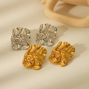Minimalist 18K gold and silver plated titanium steel earrings with lava texture design