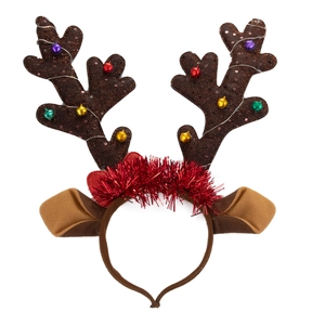 Detailed view of reindeer antler headband with colorful bells and red tinsel for Christmas