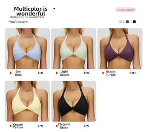 Close-up of halter yoga bra with twist-knot detail in blue, green, purple, yellow, and black