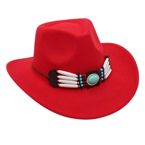 Detail of red cowboy hat with western turquoise gemstone and ethnic beadwork band