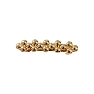 Minimalist gold beaded metal hair clip with a vintage-inspired textured spring design