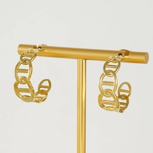 Elegant 18K gold-plated stainless steel chain link earrings shown on a display stand