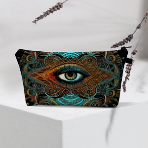 Detail of waterproof makeup bag with evil eye patterns on white geometric prop