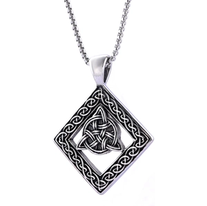 Detailed view of vintage silver Celtic knot pendant with Triquetra symbol and box chain