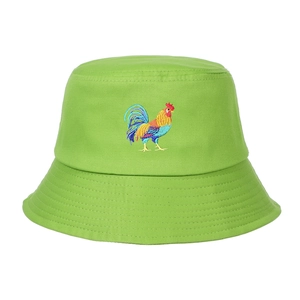Detail of lime green cotton bucket hat featuring vivid multi-color rooster embroidery