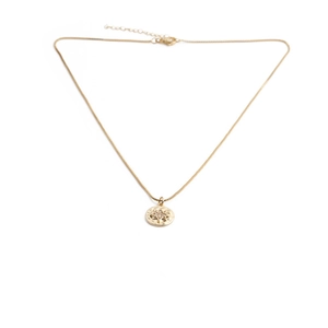 Detail of gold necklace with starburst engraved round pendant and lobster clasp closure