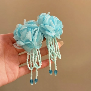 Elegant silver needle fabric flower earrings with crystal tassels in sky blue and green