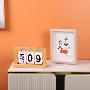 Minimalist wooden flip calendar with artistic wall art decor for home desktop office