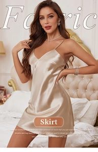 Detail of champagne gold satin nightdress showing V-neck and silky fabric texture
