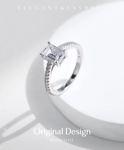 Macro detail of emerald-cut white gemstone ring with S925 silver hallmark engraving