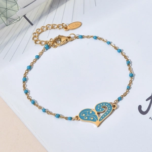 Bohemian gold stainless steel bracelet with blue beads and heart-shaped pendant