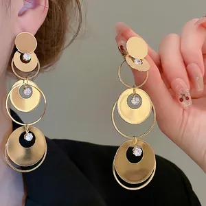 Elegant gold multi-tier round tassel drop earrings with sparkling zircon crystals