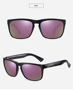 Detail view of sport sunglasses with starry splatter frame and purple gradient mirror lenses