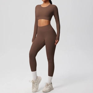 Detail of coffee brown two-piece yoga set with long sleeve crop top and high waist leggings