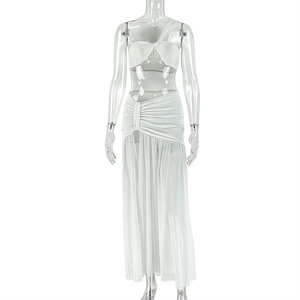 Detail view of white two-piece set featuring one-shoulder crop top and ruched maxi skirt