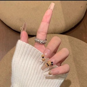 Faux ongles longs carrés avec oursons 3D, nœuds et strass dorés style français