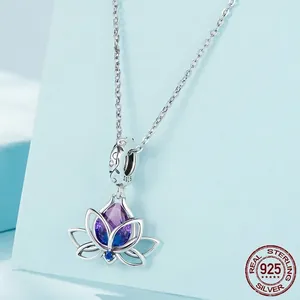 S925 Sterling Silver Lotus Pendant Necklace with Purple Teardrop Gemstone on blue stand