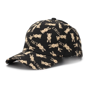 Side view detail of black baseball cap featuring rabbit print and curved brim style