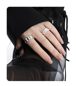 Close-up of irregular pleated texture S925 sterling silver adjustable rings for women