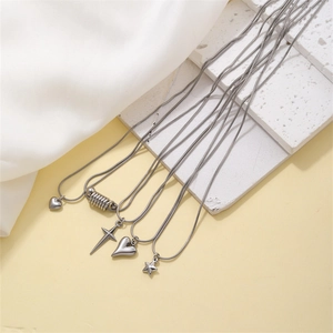 Titanium steel snake chain necklaces featuring heart, cross, and star shaped pendants