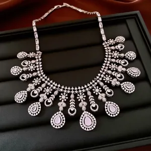 Luxurious silver water drop pendant necklace set with sparkling zircon tassels