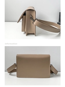 Detail of beige rectangular crossbody bag featuring adjustable wide strap and PU leather