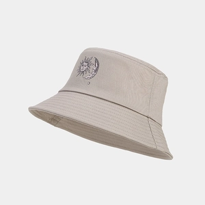 Close-up of sun and moon line art print on grey cotton bucket hat with stitched brim