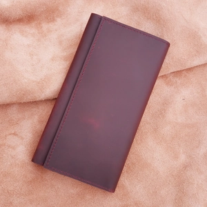 Detailed macro view of retro crazy horse leather men long wallet with refined stitching