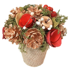 Christmas potted ornament with golden pine cones, red berries and festive roses