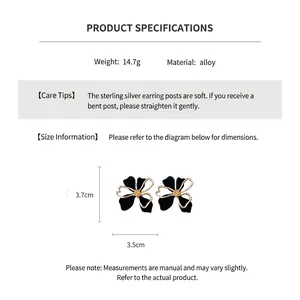 Detailed size chart for black and gold flower earrings with material and weight info