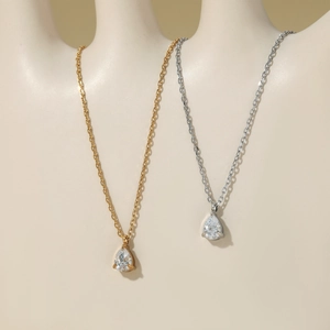 Sparkling teardrop-shaped pendant necklaces in gold and silver stainless steel