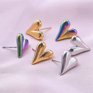 Detailed view of 304 stainless steel heart earrings in gold, silver, and iridescent colors