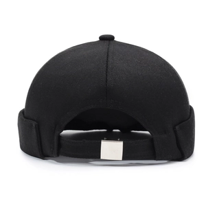 Minimalist black canvas miki hat featuring adjustable silver buckle and embroidery detail