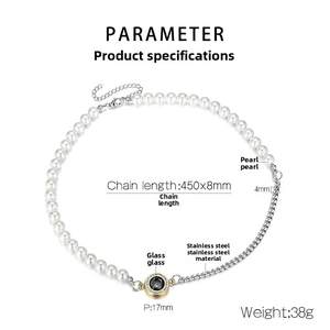 Detailed specs of two-tone cuban chain necklace with pearl stitching and pendant