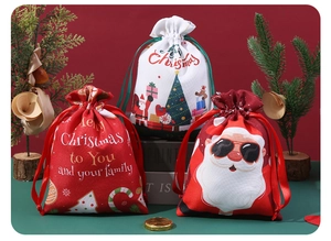 Three festive Christmas drawstring gift bags with Santa and snowman on a pine wood background
