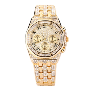 Luxurious gold-tone quartz watch with full crystal pavé octagon bezel and Roman numerals