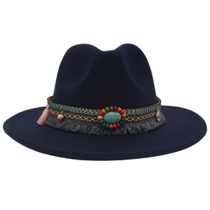 Detail of bohemian felt fedora hat featuring turquoise beads and ethnic woven band