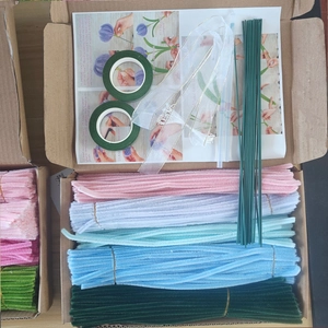 Macro view of DIY tulip kit including colorful plush sticks, floral tape and instructions