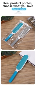 Close-up of portable lint brushes in blue and gray colors on a wooden background