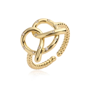 Adjustable golden twisted open ring with white zircon stones in minimalist style